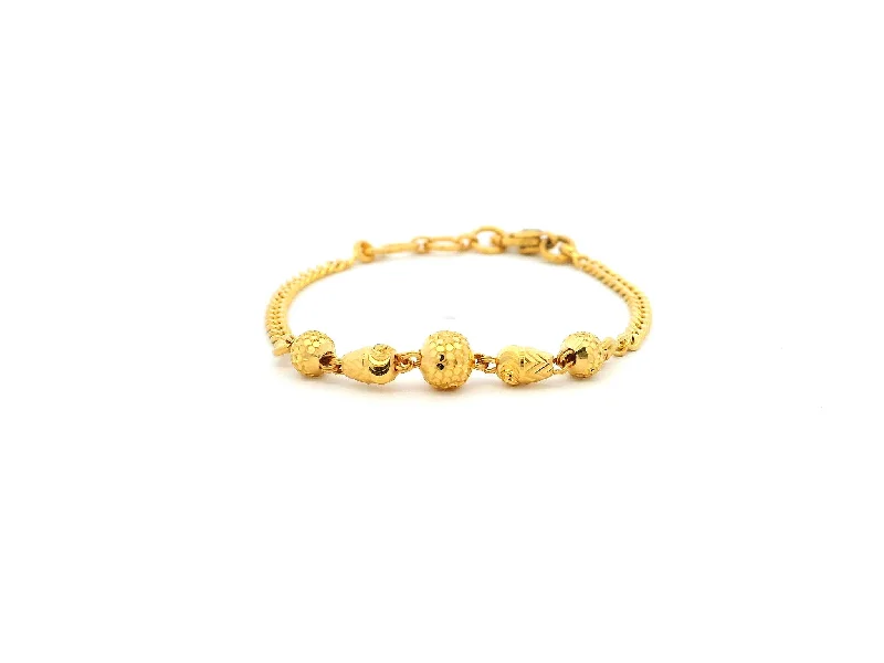 delicate charm bracelet with pearls-22ct Yellow Gold Children's Bracelet with Diamond-Cut Beads & Lobster Claw Clasp – Perfect Gift for Kids