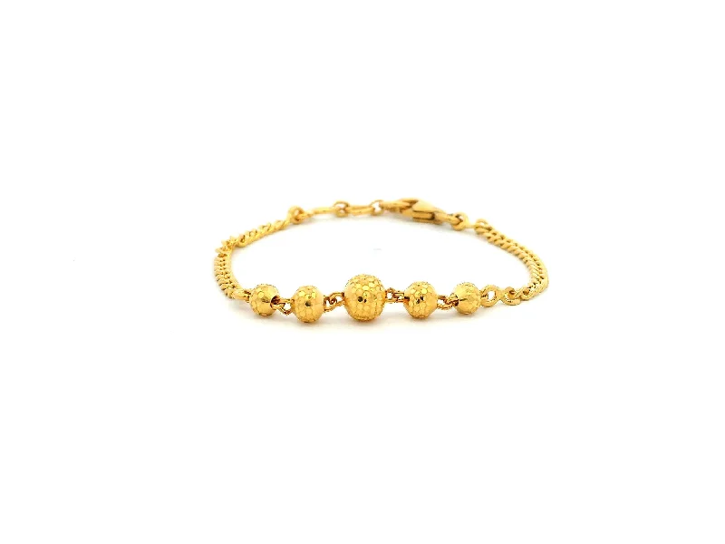 silver charm bracelet with enamel beads-22ct Yellow Gold Children's Bracelet with Diamond-Cut Beads & Lobster Claw Clasp – Stylish and Durable Jewellery for Kids