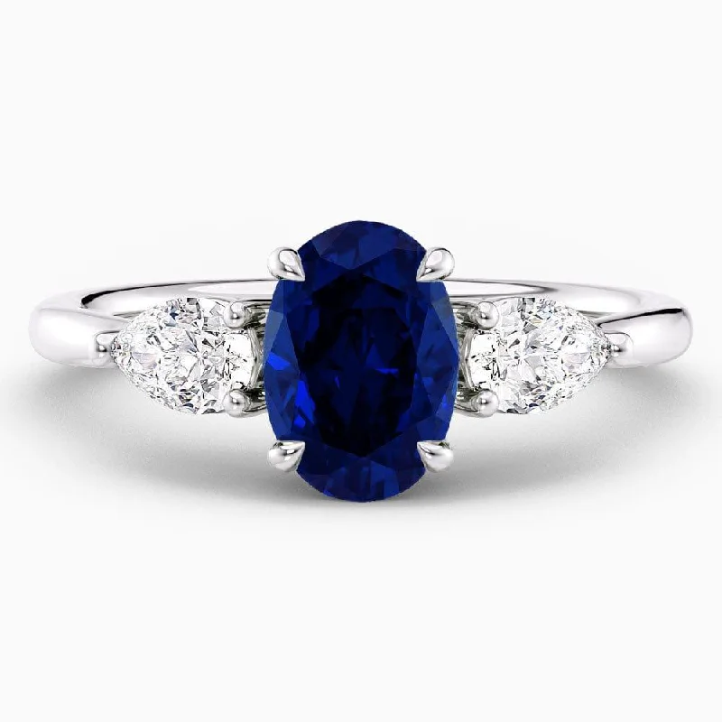 women’s engagement rings with princess-cut sapphires and diamonds-1.90 Carat Oval Shape Three Stone Blue Sapphire Engagement Ring