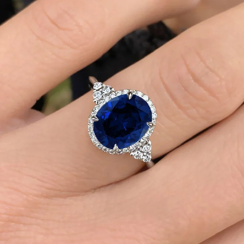 engagement rings with square diamonds and sapphire pave designs-5.50 Carat Oval Shape Halo Blue Sapphire Engagement Ring