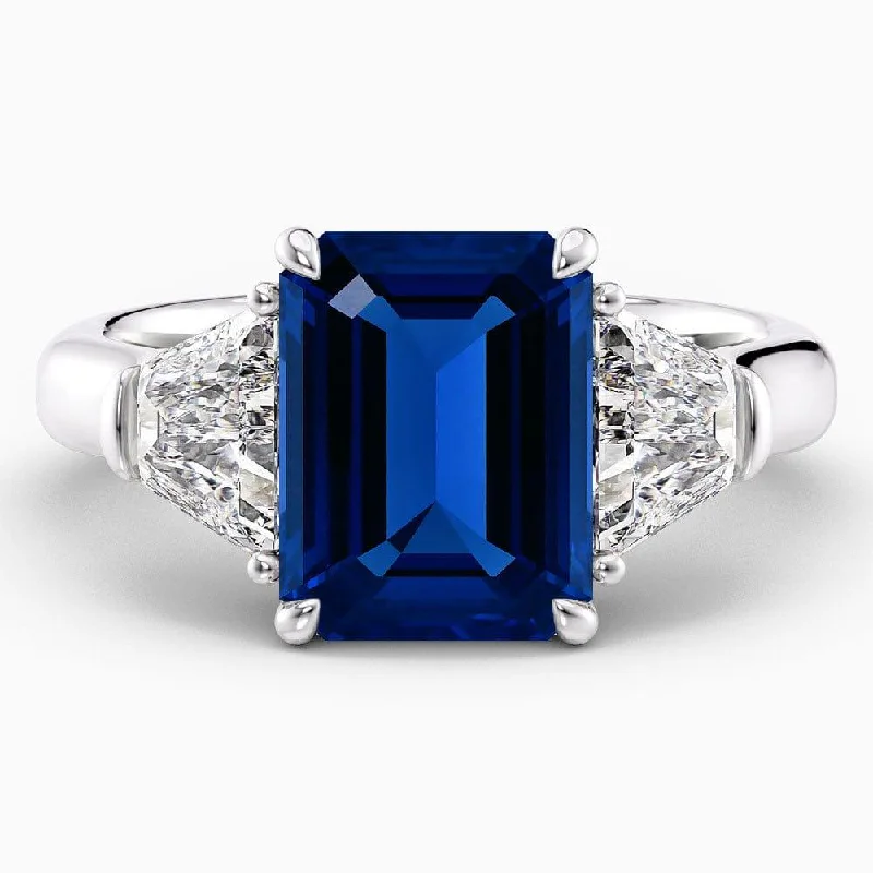 women’s rings with oval diamonds and sapphire settings-6 Carat Emerald Shape Three Stone Blue Sapphire Engagement Ring